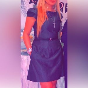 HALSTON HERITAGE agree woven dress with low back and front pockets.